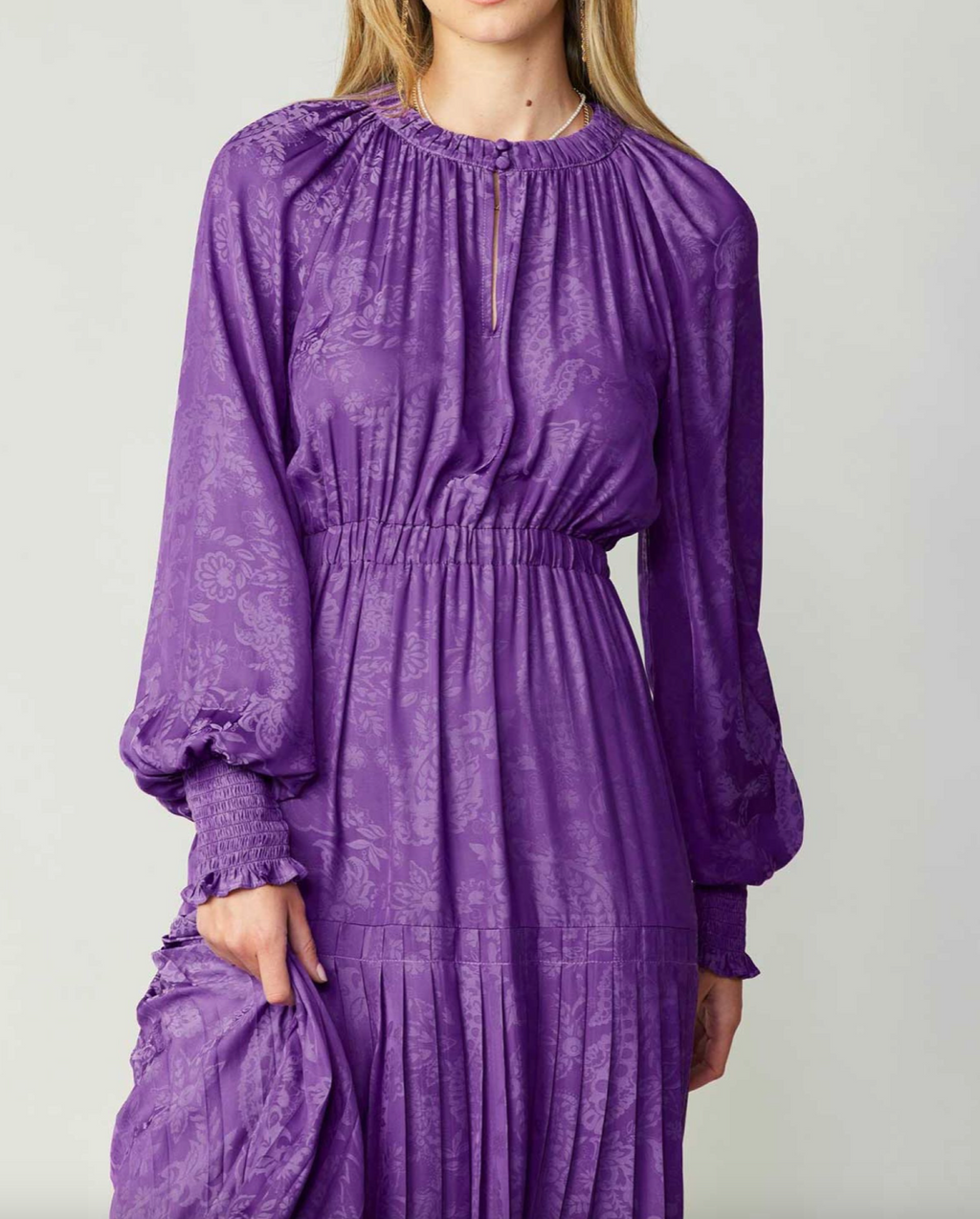 Poised in Purple Dress